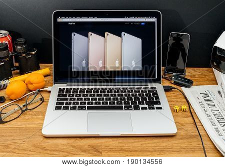 PARIS FRANCE - JUNE 6 2017: Apple Computers website on MacBook Retina in creative environment showcasing latest news from Apple at WWDC 2017 - all iPad Pro available colors silver space gray and gold.