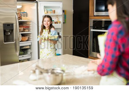 Daughter Helping Mom In The Kitchen