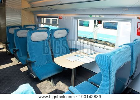 MOSCOW, SEP,18, 2011, Exhibition EXPO1520: Modern new generation high speed passenger train saloon interior chairs seats tables. High speed train Sapsan Siemens. Event organizer Business Dialogue