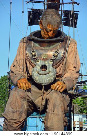 MONTREAL QUEBEC CANADA 19 05 17: The giant deep-sea diver in the street of Montreal for the 375e anniversary of the city, by Royal De Luxe company Nantes France