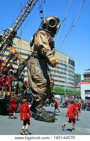 MONTREAL QUEBEC CANADA 19 05 17: The giant deep-sea diver sleeping in the street of Montreal for the 375e anniversary of the city, by Royal De Luxe company Nantes France