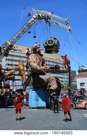 MONTREAL QUEBEC CANADA 19 05 17: The giant deep-sea diver sleeping in the street of Montreal for the 375e anniversary of the city, by Royal De Luxe company Nantes France