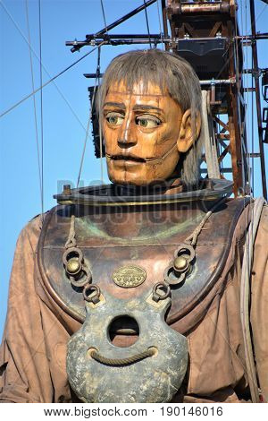 MONTREAL QUEBEC CANADA 19 05 17: The giant deep-sea diver sleeping in the street of Montreal for the 375e anniversary of the city, by Royal De Luxe company Nantes France