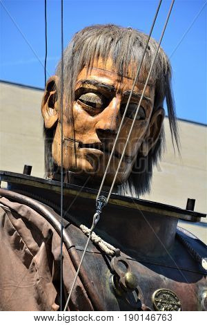 MONTREAL QUEBEC CANADA 19 05 17: The giant deep-sea diver sleeping in the street of Montreal for the 375e anniversary of the city, by Royal De Luxe company Nantes France