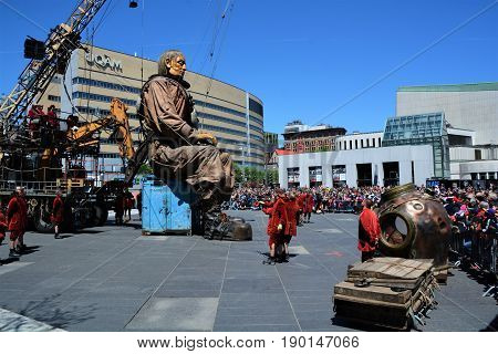 MONTREAL QUEBEC CANADA 19 05 17: The giant deep-sea diver sleeping in the street of Montreal for the 375e anniversary of the city, by Royal De Luxe company Nantes France