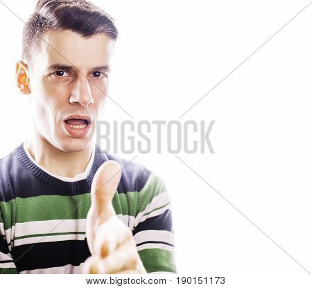 Portrait of a smart serious young man standing against white background. Emotional concept for gesture close up