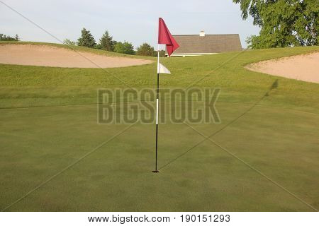 A golf course flagstick (