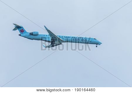Richmond Canada - June 4, 2017, Jet aircraft in the morning going to YVR Airport