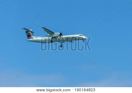 Richmond Canada - June 4, 2017, Jet aircraft in the morning going to YVR Airport