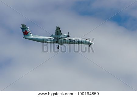 Richmond Canada - June 4, 2017, Jet aircraft in the morning going to YVR Airport