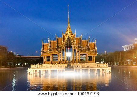 A beautiful temple in reflection in twilight sunset Thailand