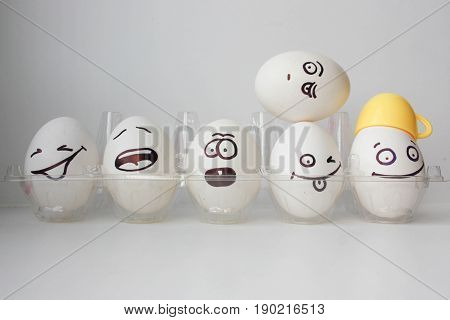 Eggs With Painted Face. Photo For Your Design