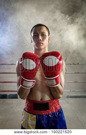Muay Thai a strong ready for the fight in the fight of Muay Thai. This is a Martial art of Thailand and the world. Muay Thai International extreme sport.