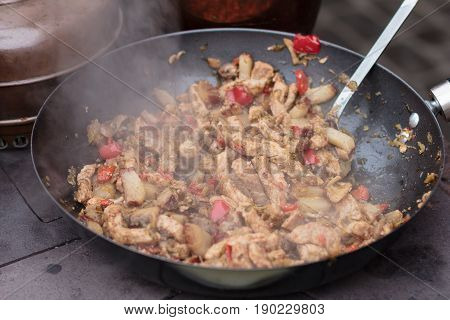 Grilling shashlik on barbecue grill. Selective focus