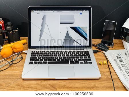 PARIS FRANCE - JUNE 6 2017: Apple Computers website on MacBook Retina in creative environment showcasing latest news from Apple at WWDC 2017 - design of the lastest imac computer