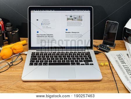PARIS FRANCE - JUNE 6 2017: Apple Computers website on MacBook Retina in creative environment showcasing latest macOS High Sierra from Apple at WWDC 2017 - new Safari browser with new specification