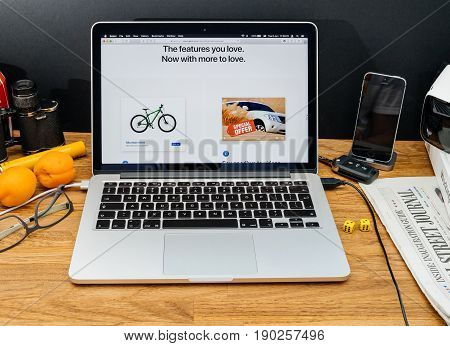 PARIS FRANCE - JUNE 6 2017: Apple Computers website on MacBook Retina in creative environment showcasing latest macOS High Sierra from Apple at WWDC 2017 - new Safari browser with new specification