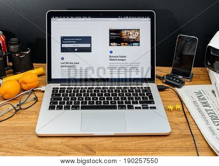 PARIS FRANCE - JUNE 6 2017: Apple Computers website on MacBook Retina in creative environment showcasing latest macOS High Sierra from Apple at WWDC 2017 - new Safari browser with new specification