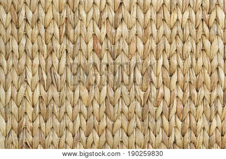 Meshwork of woven reed wicker texture background