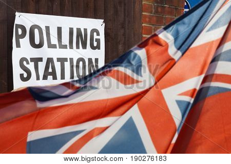 polling station sign and Union Jack flag - UK general elections