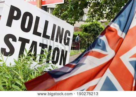 polling station sign and Union Jack flag - UK general elections