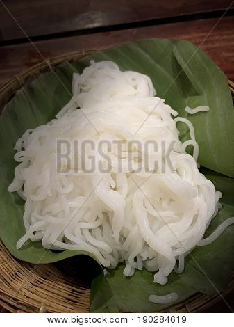 Thai Vermicelli Eaten With Curry, Thai Food, Rice Vermicelli In Basket With Banana Leaf, Still Life