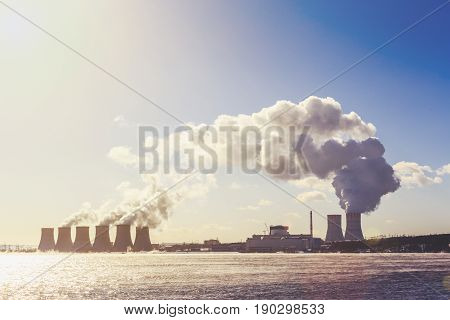 Nuclear Power Plant or NPP, clouds of thick smoke, radioactive energy production concept