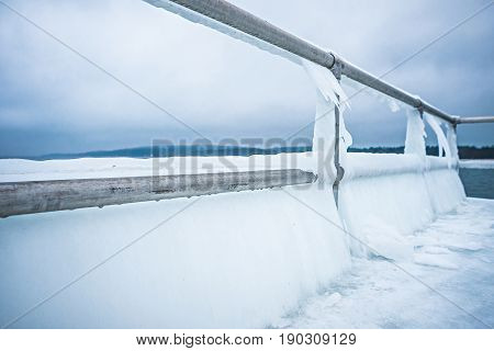Frozen Lake Michihgan Coastline And Piers In Winter