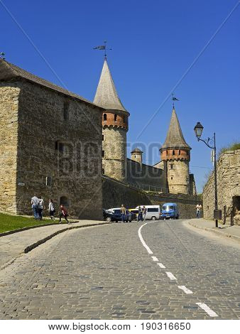 Kamyanets-Podilsky Ukraine - 19 May 2017: Tourists visiting the castle often going by cars.