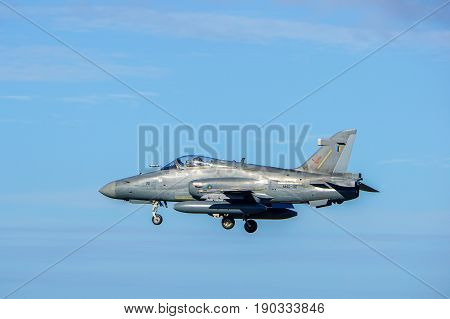 Labuan,Malaysia-June 9,2017:The Royal Malaysian Air Force BAE Hawk 208 fighter jet is landing in Labuan airport,Malaysia.On 2013,the Hawk 208 was used in air strikes against the Filipino insurgents.