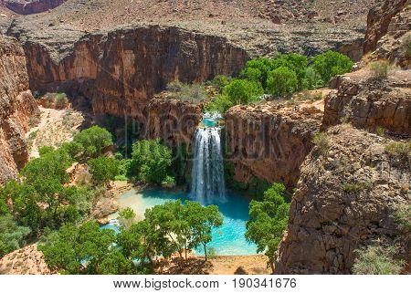 Havasu Falls Oasis in the middle of the Arizona Desert. Landscape image taken from above the falls.