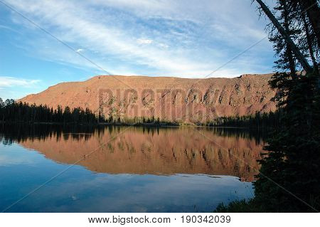 Evening light reflecting from the mountain on Grandaddy Lake in the High Uintas in Utah