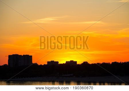 Orange Sunset Over A River Dnieper In Kremenchug City, Ukraine