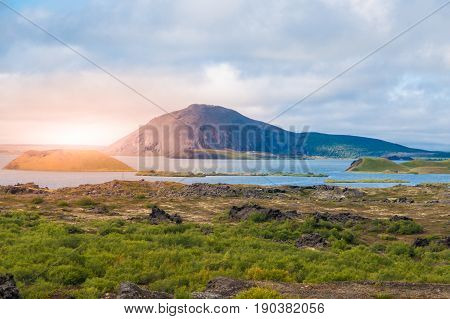 Sunset time in volcanic landscape at Myvatn Lake, aka Lake of mosquitos, northern Iceland.