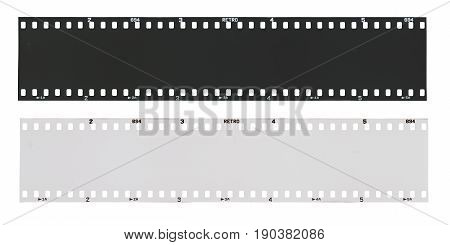 Empty black and 135 type (35mm) white film strip template in negative and positive isolated on white background with work path.