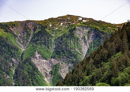 Evergreen Covered Rock Moiuntains in Alaska Wilderness