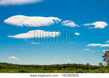 White clouds in the blue summer sky