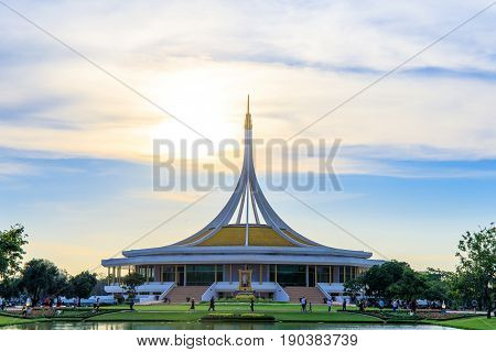 Bangkok, Thailand. - April 23, 2017 : Sunlight, Sunrays or sunbeam star over the roof of Ratchamangkhala Pavilion at public park name Suan Luang Rama IX on sunset time Bangkok, Thailand.