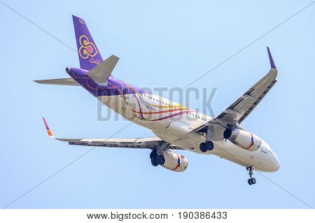 Bangkok, Thailand. - April 23, 2017 : Plane of Thai Airways in the sky landing to Suvanabhumi airport.
