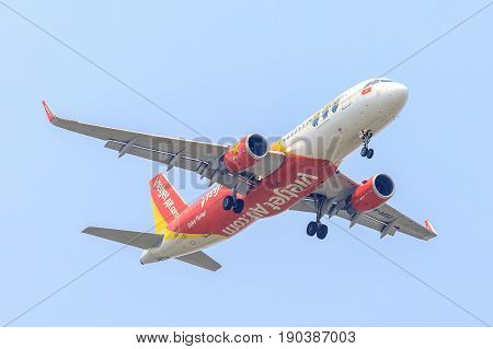 Bangkok, Thailand. - April 22, 2017 : Plane of VietjetAir Airways on the sky landing to Suvanabhumi airport.