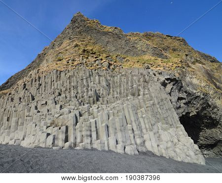 Basalt columns in southern Iceland's black sand beach.
