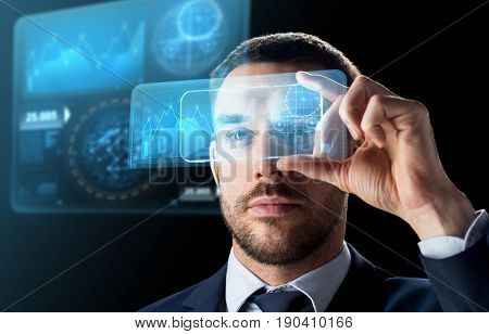 business, augmented reality and future technology concept - businessman working with transparent smartphone and virtual screens projections over black background