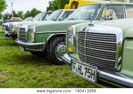 PAAREN IM GLIEN GERMANY - JUNE 03 2017: Various retro cars Mercedes-Benz stand in a row. Focus on the foreground. Exhibition "Die Oldtimer Show".