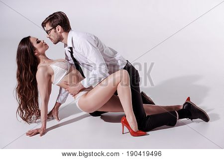 Passionate Sexy Woman In Underwear Seducing Elegant Man In Foreplay