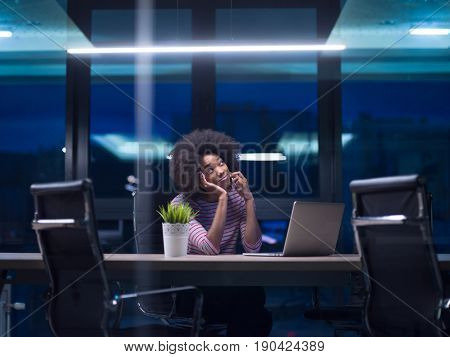 Young african american female Entrepreneur Freelancer Working Using A Laptop In Coworking space