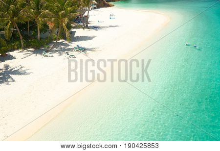 Beautiful beach aerial view over a Rawa island. White sandy beach seen from above. Malaysia .