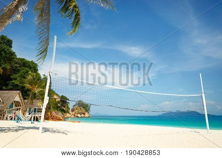 Rawa Beach with beach volleyball court in sunny day world famous destination beautiful weather and idyllic tropical island .