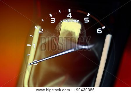 Double exposure. Gear stick for manual transmission and Rpm. gauge meter for speed driving in car. Automotive part concept.