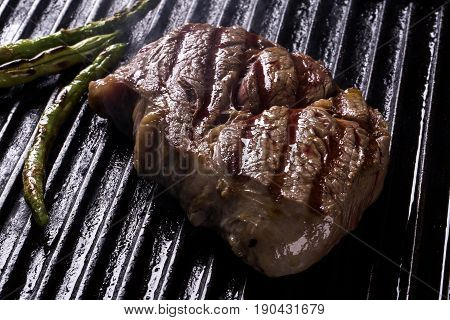 Ancho Steak With Grilled Vegetables On The Grill