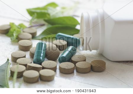 pill herbal on top view of wood table and copy space